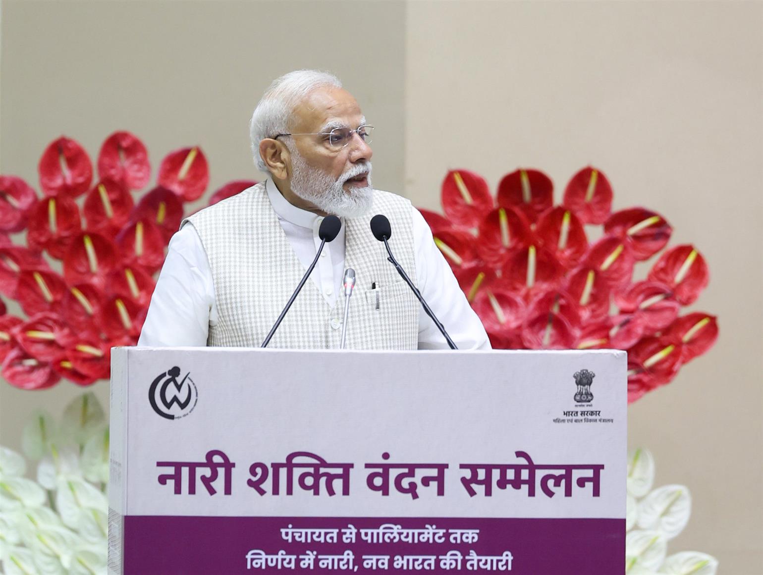 PM addressing the gathering at the ‘Nari Shakti Vandan Sammelan’ at Vigyan Bhawan, in New Delhi 