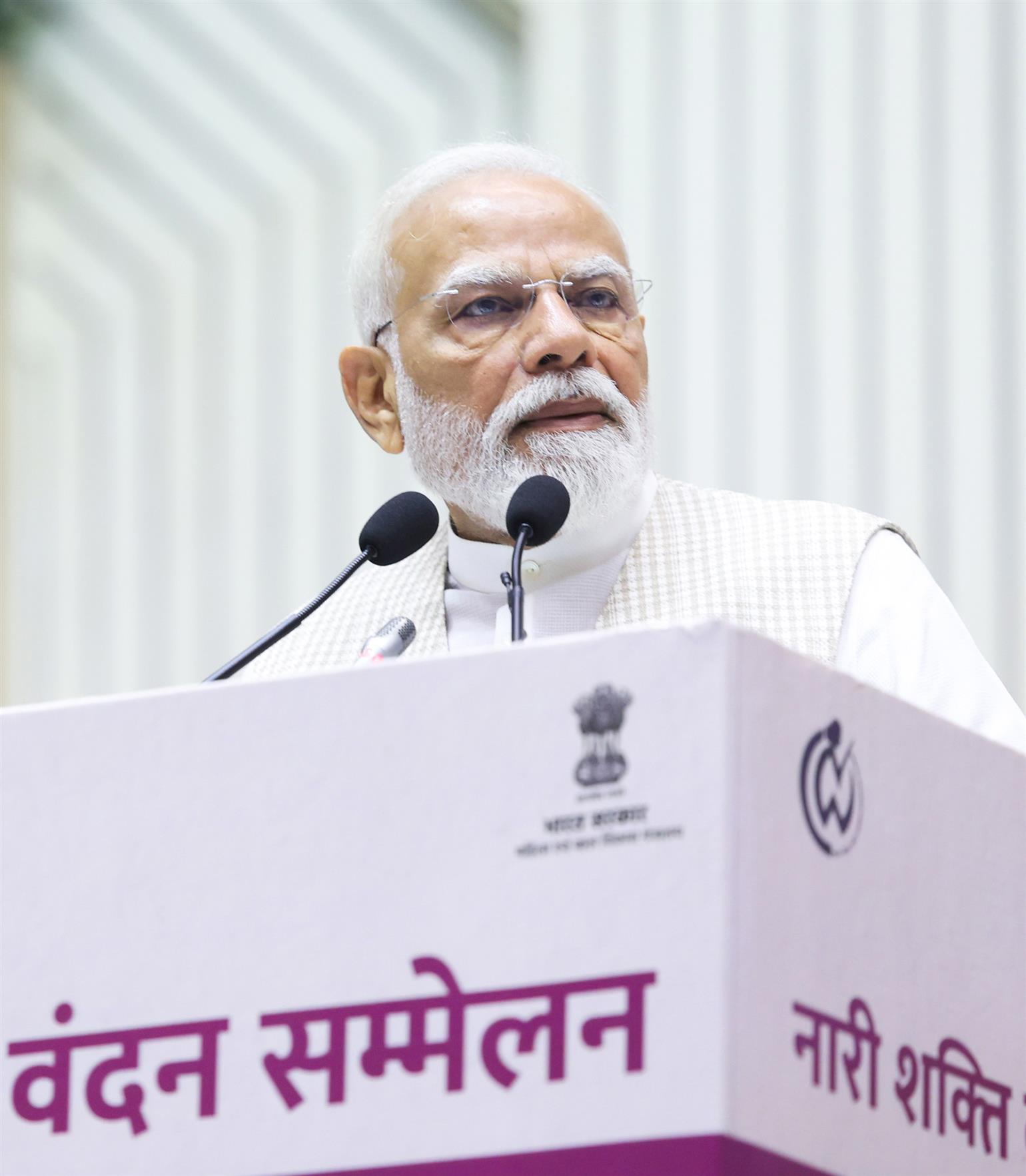 PM addressing the gathering at the ‘Nari Shakti Vandan Sammelan’ at Vigyan Bhawan, in New Delhi 
