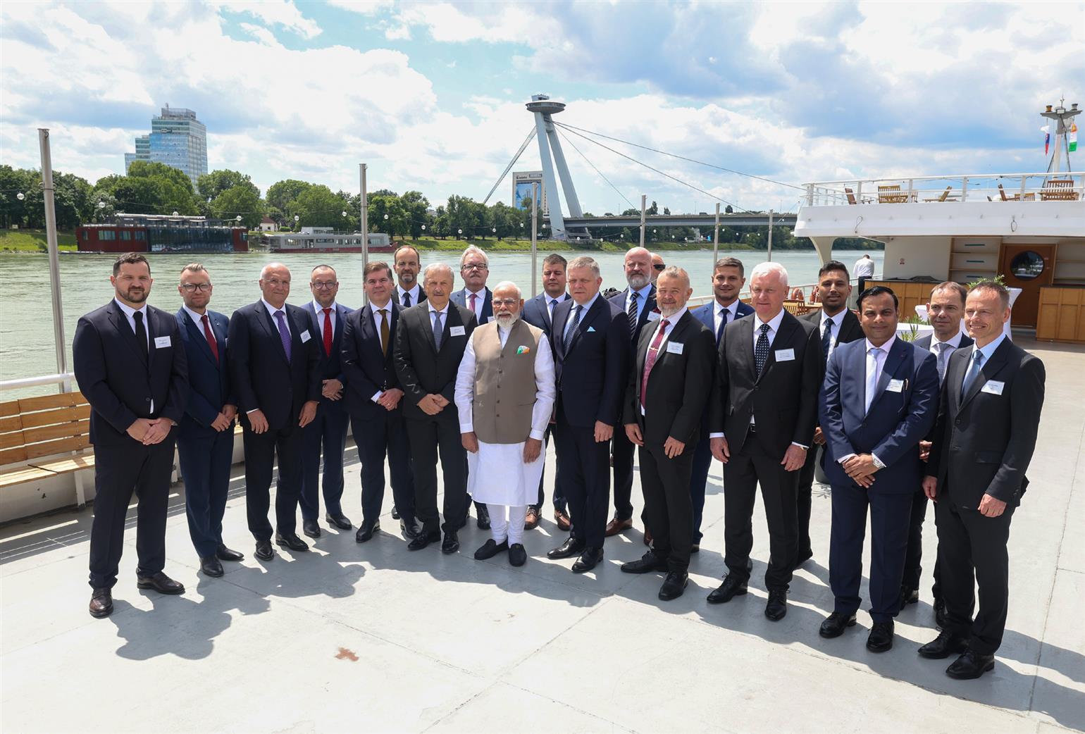 PM in a group photograph with the Prime Minister of Slovakia, Mr. Robert Fico and prominent Slovak business leaders at Bratislava, in Slovakia. 