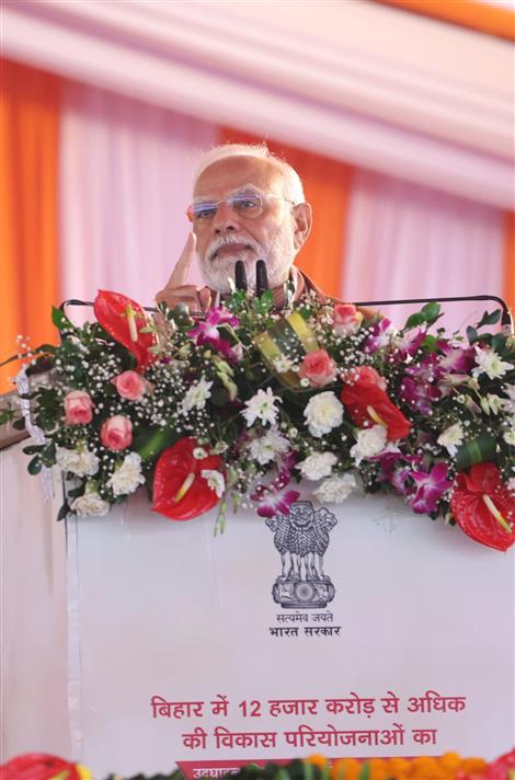 PM addressing the gathering during the inauguration, laying foundation stone and dedication to the nation multiple development projects worth around Rs 12,100 crore at Darbhanga, in Bihar on November 13, 2024.