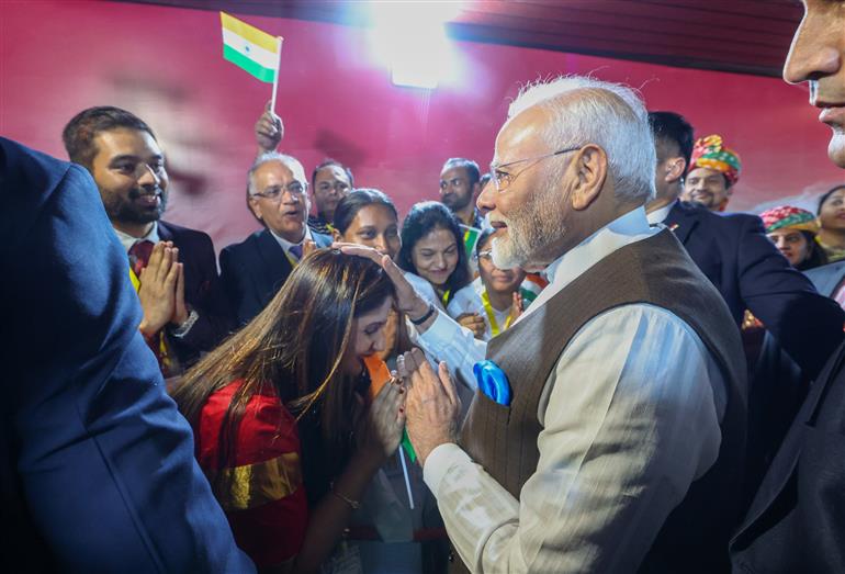 PM receives warm welcome by Indian Community at Abuja, in Nigeria on November 16, 2024.