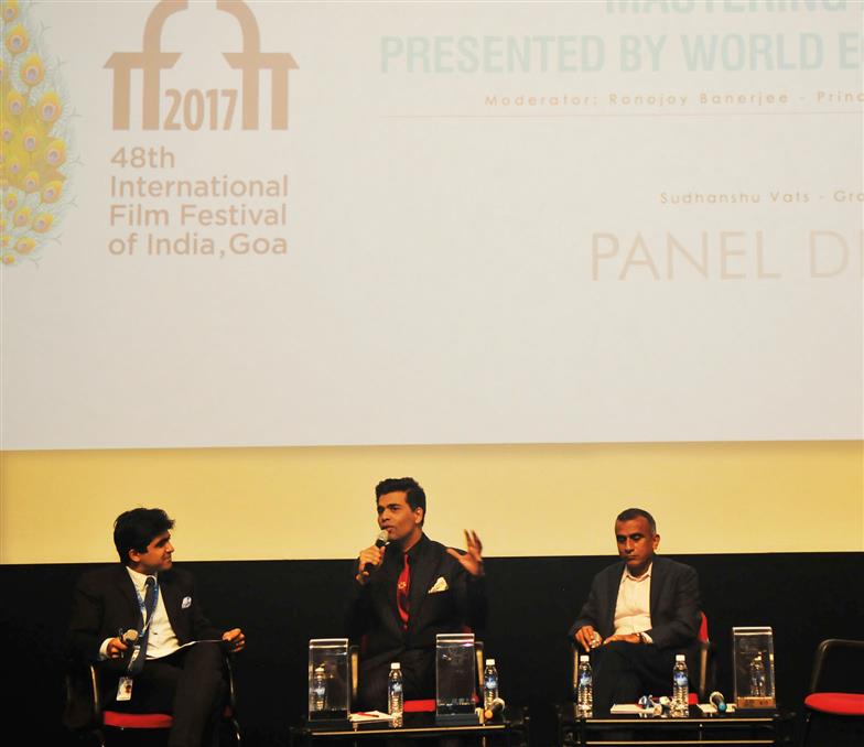 The Moderator Ronojoy Banerjee and Panelists Karan Johar and Sudhanshu Vats, at the Panel Discussion on ‘How to make your own film’, during the 48th International Film Festival of India (IFFI-2017), in Panaji, Goa on November 27, 2017.:Ministry of Information & Broadcasting