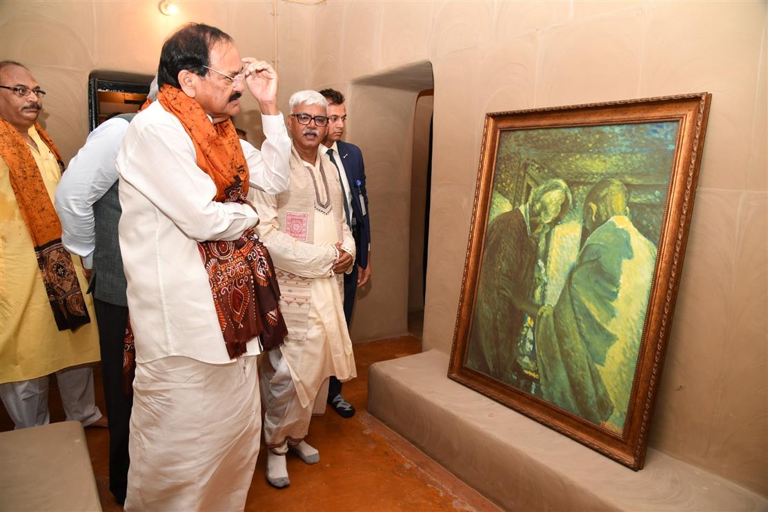 The Vice President of India, Shri M. Venkaiah Naidu looking at the portrait of Rabindranath Tagore and Mahatma Gandhi at ‘Shyamoli’, the ancestral house of Gurudeb Rabindranath Tagore renovated by the Archaeological Survey of India, in Kolkata on August 16, 2019. The Governor of West Bengal, Shri Jagdeep Dhankar and others are also seen.