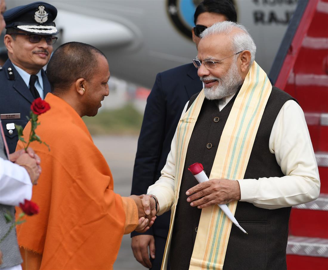 The Prime Minister, Shri Narendra Modi being received by the Chief Minister of Uttar Pradesh, Yogi Adityanath, on his arrival, at Kanpur, in Uttar Pradesh on December 14, 2019.