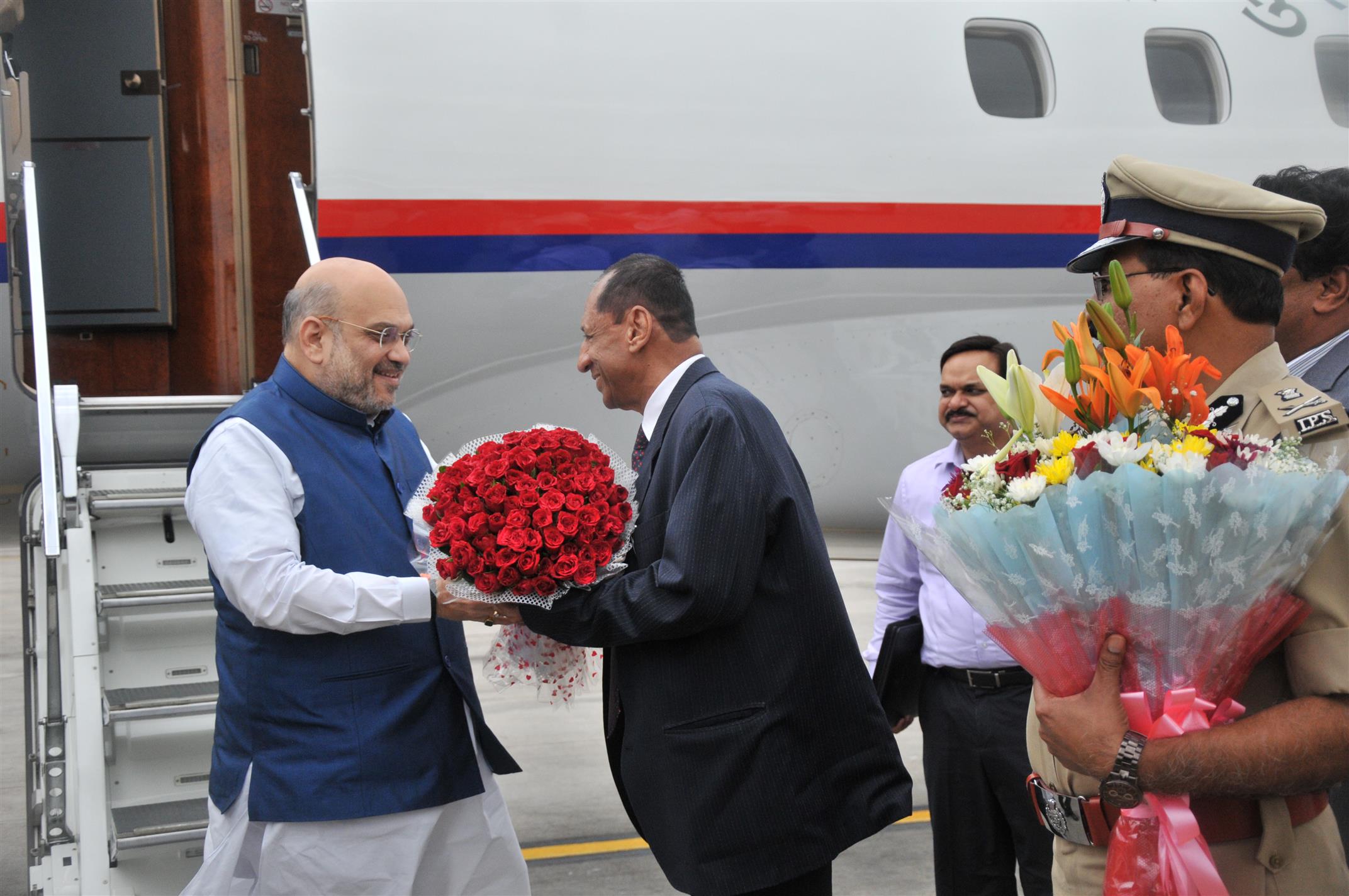 The Union Home Minister, Shri Amit Shah  being received by the  Governor of Telangana and AP Shri ESL Narasimhan on his arrival at RGI Airport in Hyderabad on July 06, 2019.  