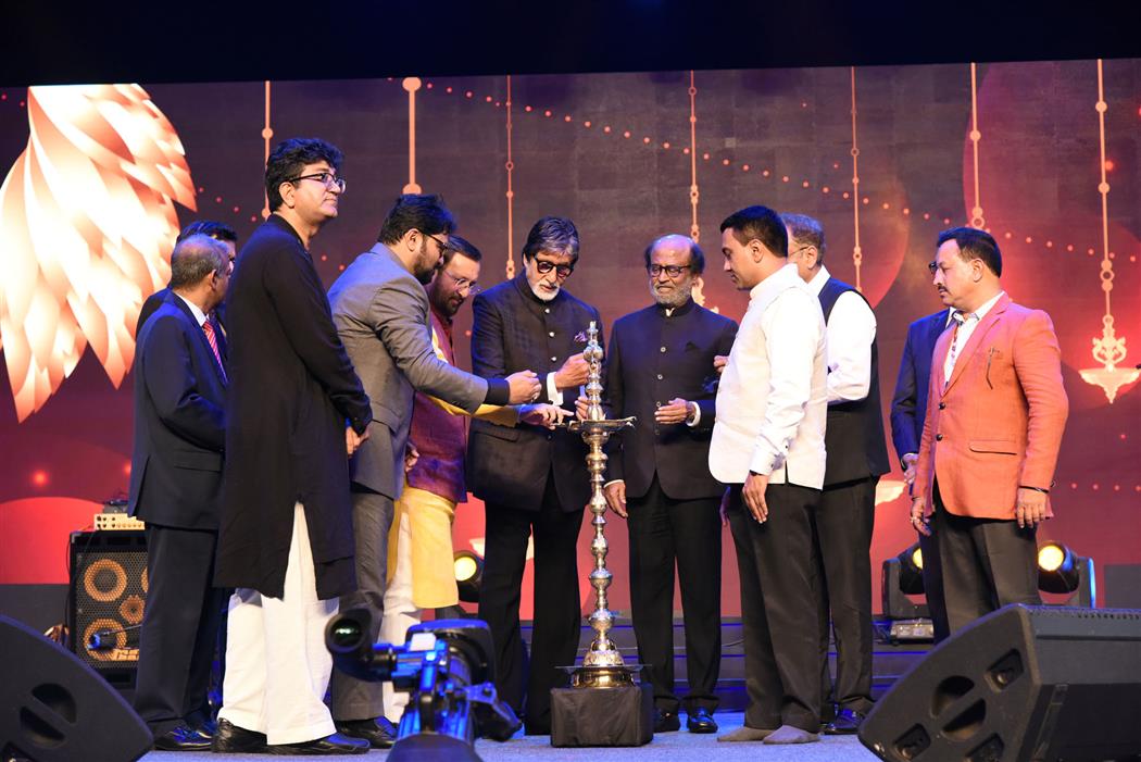 The Minister for Information & Broadcasting, Shri Prakash Javadekar lighting the lamp at the inauguration of Golden Jubilee edition of International Film Festival of India (IFFI-2019) in Goa on November 20, 2019.MoS for Environment, Forest & Climate Change, Shri Babul Supriyo, Secretary, Ministry of Information & Broadcasting, Shri Amit Khare, Superstar, Shri Amitabh Bachchan, Rajinikanth and other dignitaries are also seen.