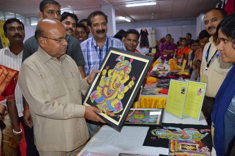 The Union Minister of Social Justice & Empowerment Dr Thawar Chand Gehlot going through an exhibition at National Institute of Locomotor Disabilities (NILD), the artistry of the PwDs on September 30, 2019.