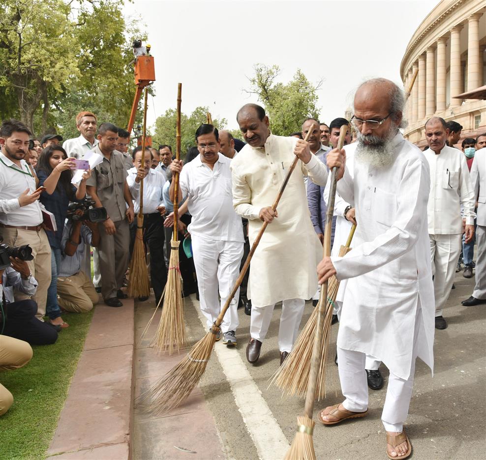 The Speaker, Lok Sabha, Shri Om Birla and other dignitaries participating in cleanliness drive, during the Swachhata Abhiyan, at Parliament House, in New Delhi on July 13, 2019.