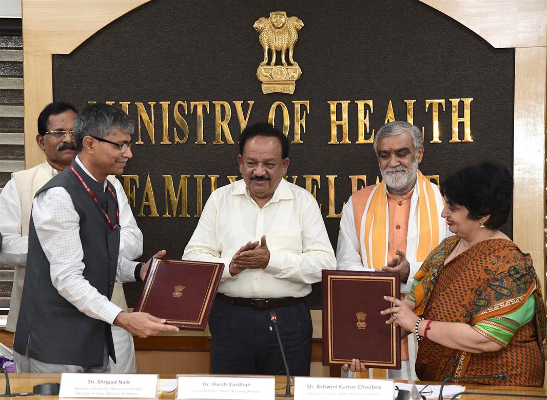 The Union Minister for Health & Family Welfare, Science & Technology and Earth Sciences, Dr. Harsh Vardhan along with the Minister of State for AYUSH (Independent Charge) and Defence, Shri Shripad Yesso Naik and the Minister of State for Health and Family Welfare, Shri Ashwini Kumar Choubey witnessing the signing ceremony of MoUs between Ministry of Health & Family Welfare, Ministry of AYUSH, Ministry of Defence and Ministry of Railways, in New Delhi on July 18, 2019.