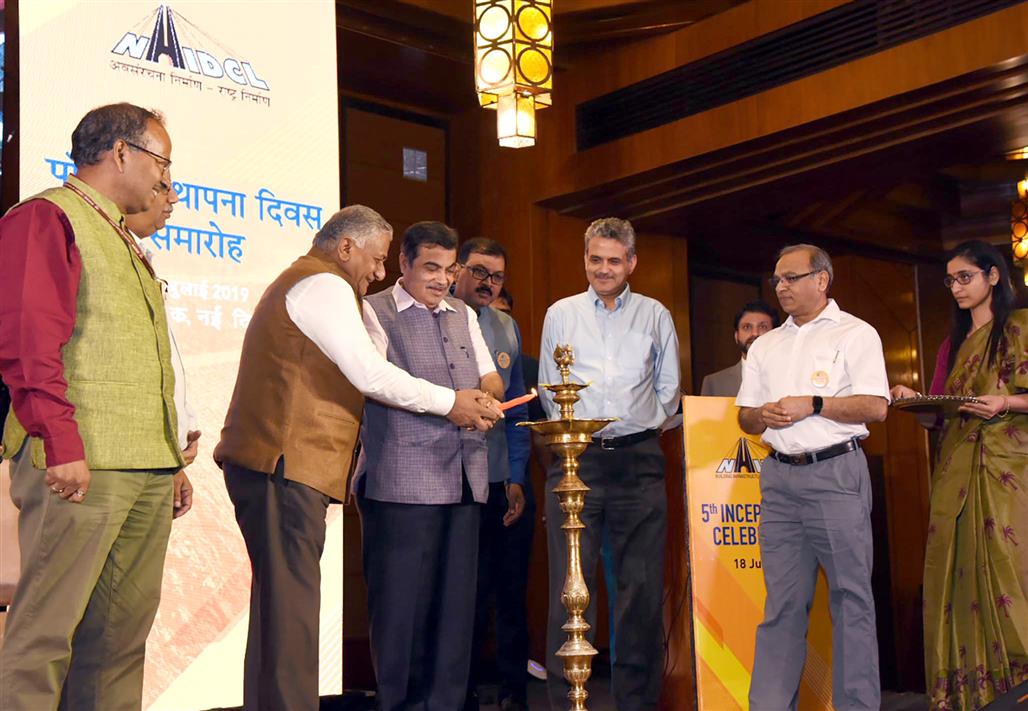 The Union Minister for Road Transport & Highways and Micro, Small & Medium Enterprises, Shri Nitin Gadkari lighting the lamp at the 5th Inception Day Celebrations of NHIDCL, in New Delhi on July 18, 2019. The Minister of State for Road Transport and Highways, General (Retd.) V.K. Singh and other dignitaries are also seen. 