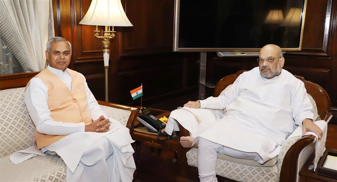 The newly appointed Governor of Gujarat, Shri Acharya Dev Vrat meeting the Union Home Minister, Shri Amit Shah, in New Delhi on July 20, 2019.