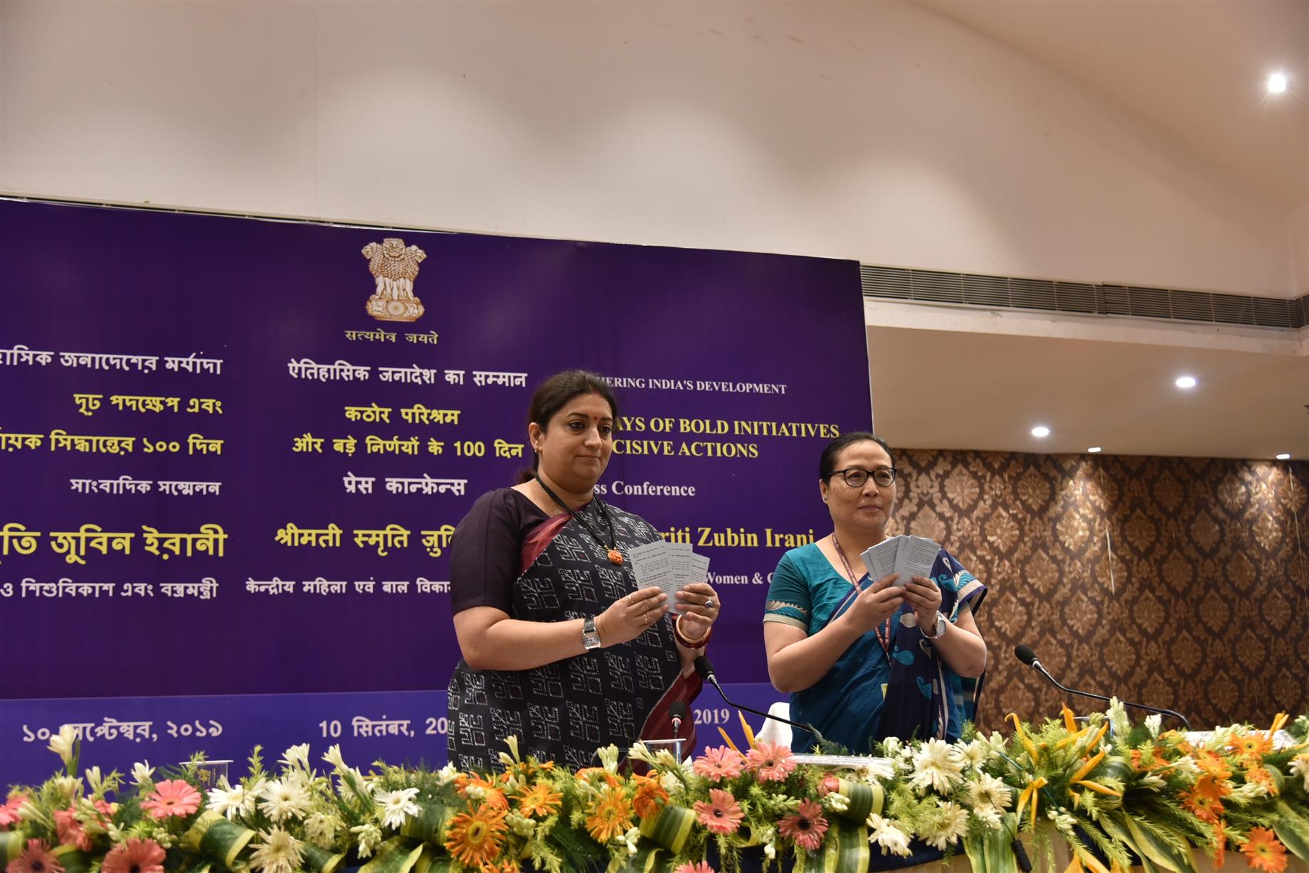Union Minister for Women and Child Development and Textiles, Smt Smriti Zubin Irani releasing a booklet on the occasion of 100 days of Bold Initiatives and Decisive Actions taken by the Central Government  in Kolkata on September 10, 2019. 