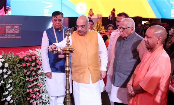 The Union Home Minister, Shri Amit Shah inaugurating the 2nd Ground Breaking Ceremony of the UP Investors Summit, at Lucknow on July 28 2019. The former Governor of Uttar Pradesh, Shri Ram Naik, the Chief Minister of Uttar Pradesh, Yogi Shri Adityanath and other dignitaries are also seen. 