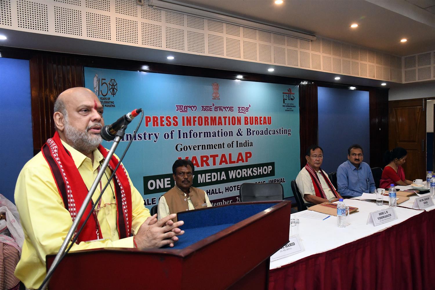  Shri L R Vishwanath Director General , Ministry of Information &  Broadcasting delivering his speech at the  inauguration of  Vartalap organized by Press Information Bureau, Imphal on 12th September 2019. Dr. R.K. Ranjan Singh , Member of Parliament, Lok Sabha, Imphal, Manipur and Shri Abhishek Dayal, Director, PIB  Imphal are also seen.