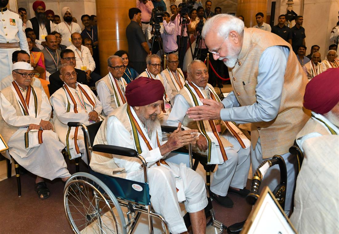 The Prime Minister, Shri Narendra Modi interacting with the Freedom Fighters, during the ‘At Home’ function, hosted by the President, Shri Ram Nath Kovind, on the occasion of 77th Anniversary of the Quit India Movement, at Rashtrapati Bhavan, in New Delhi on August 09, 2019.