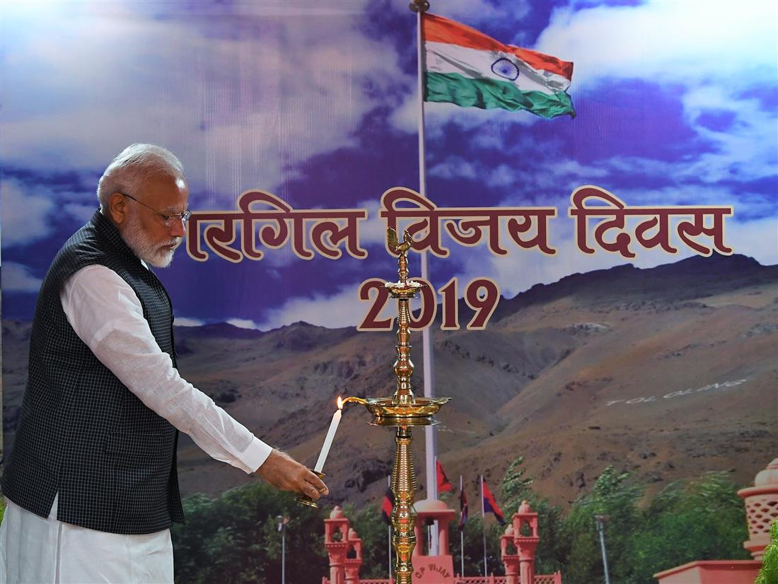 The Prime Minister, Shri Narendra Modi lighting the lamp at a programme to mark Kargil Vijay Diwas, in New Delhi on July 27, 2019.