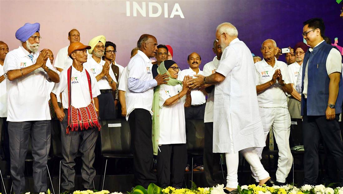 The Prime Minister, Shri Narendra Modi at the launch of the ‘Fit India Movement’, on the occasion of the National Sports Day, at the Indira Gandhi Indoor stadium, in New Delhi on August 29, 2019. The Minister of State for Youth Affairs & Sports (Independent Charge) and Minority Affairs, Shri Kiren Rijiju is also seen. 