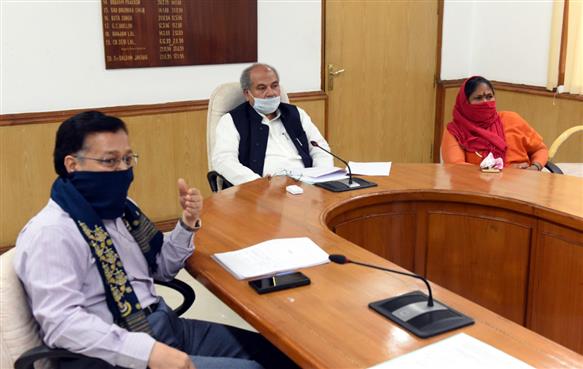 The Union Minister for Agriculture & Farmers Welfare, Rural Development and Panchayati Raj, Shri Narendra Singh Tomar chairing a review meeting of all flagship schemes of Ministry of Rural Development, in New Delhi on April 16, 2020. 
The Minister of State for Rural Development, Sadhvi Niranjan Jyoti and the Secretary (Rural Development), Shri Rajesh Bhushan are also seen.
