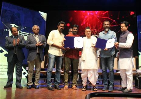 Director Nagaraj Manjule and Producer Balkrushna Manjule receiving the Silver Conch Award for the Best Short Fiction Film, for their film Paavsacha Nibandh (An Essay of Rain), at 16th edition of Mumbai International Film Festival, in Mumbai, on February 3, 2020