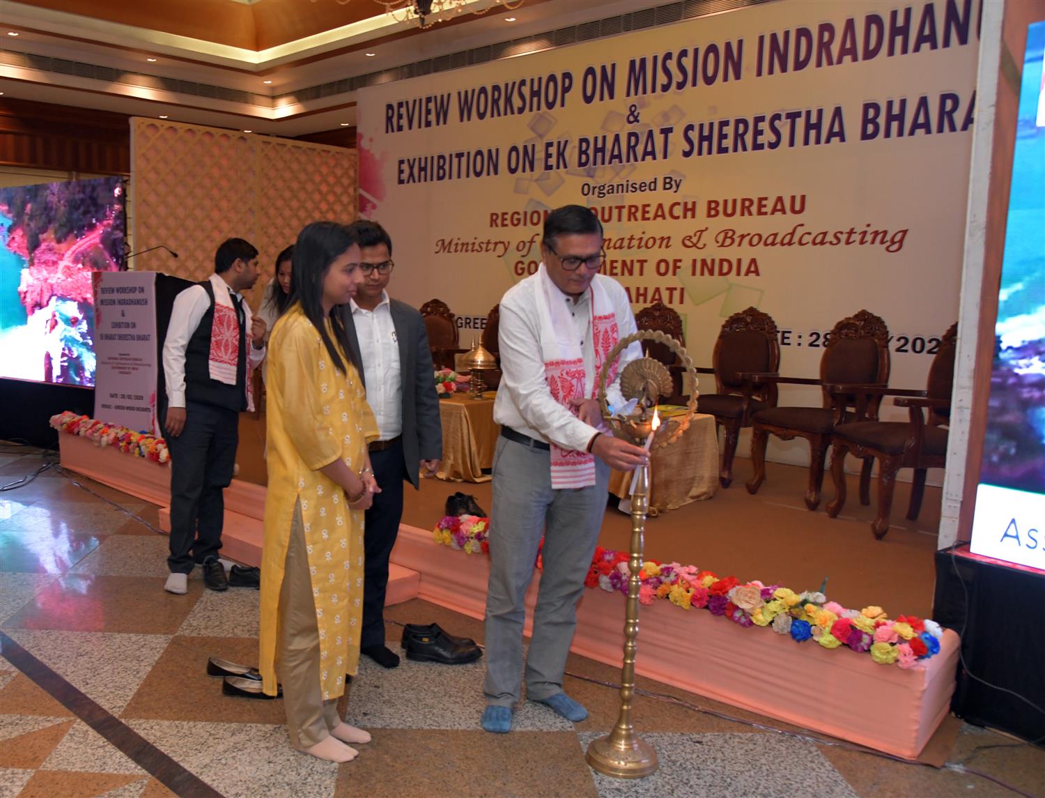  Shri  R. C. Jain, Chairman, SEBA lighting the lamp to inaugurate  Review Workshop on Mission Indradhanush 2.0 organized by Regional Outreach Bureau, Government of India  Guwahati on 28th February 2020.