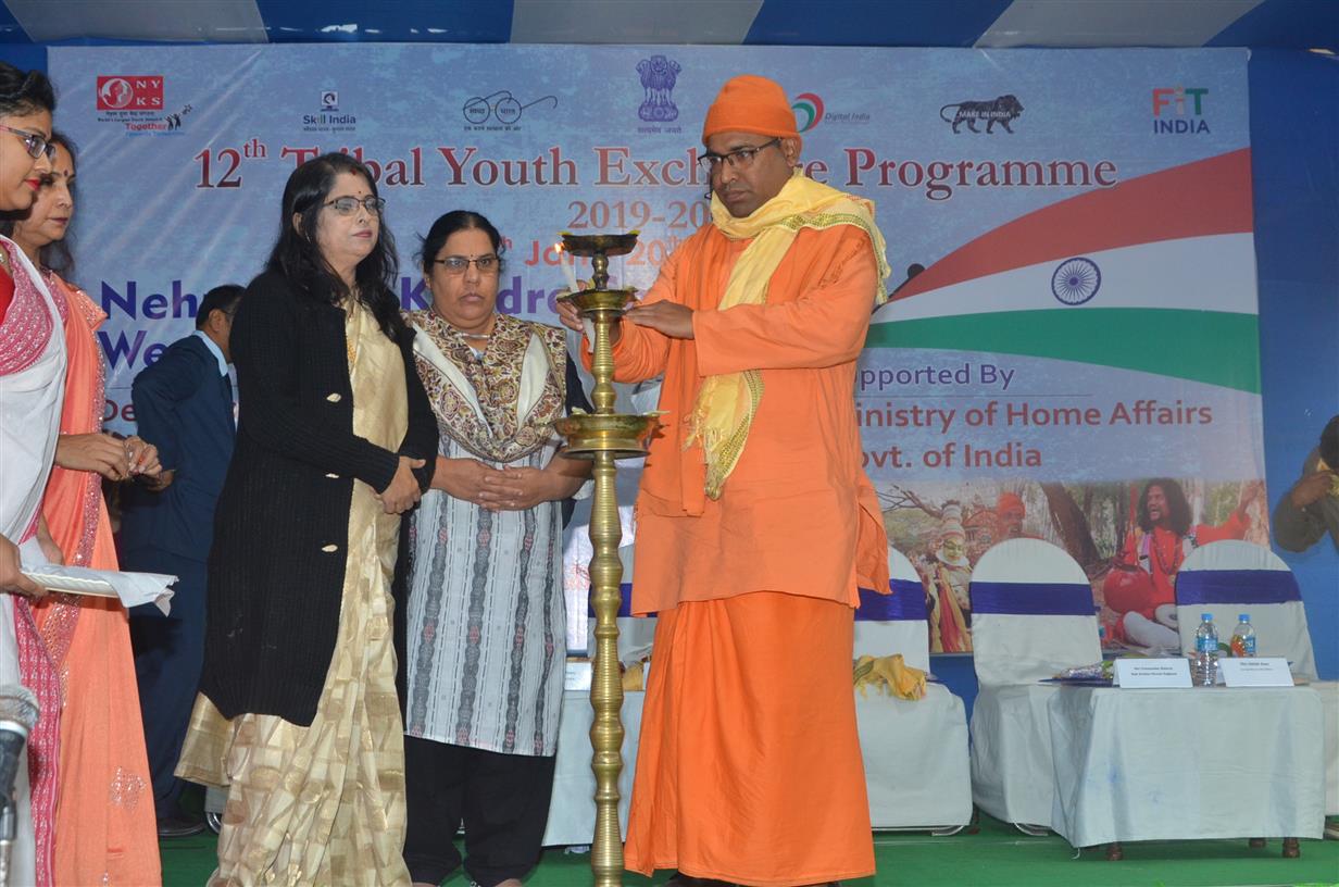 Swami Avinandananand Maharaj of  Ram Krishna Mission Bagbazar, Smt Jaba Chakraborty , Deputy Director NYKS and Smt Sarita Patel, NSSO were lighting the lamp at  the  Opening ceremony of 12th Tribal Youth Exchange programme at Vivekananda Yuva Bharati Krirangan, Salt Lake. The programme was sponsored by the Ministry of Home Affairs, Government of  India. 14th January 2020
