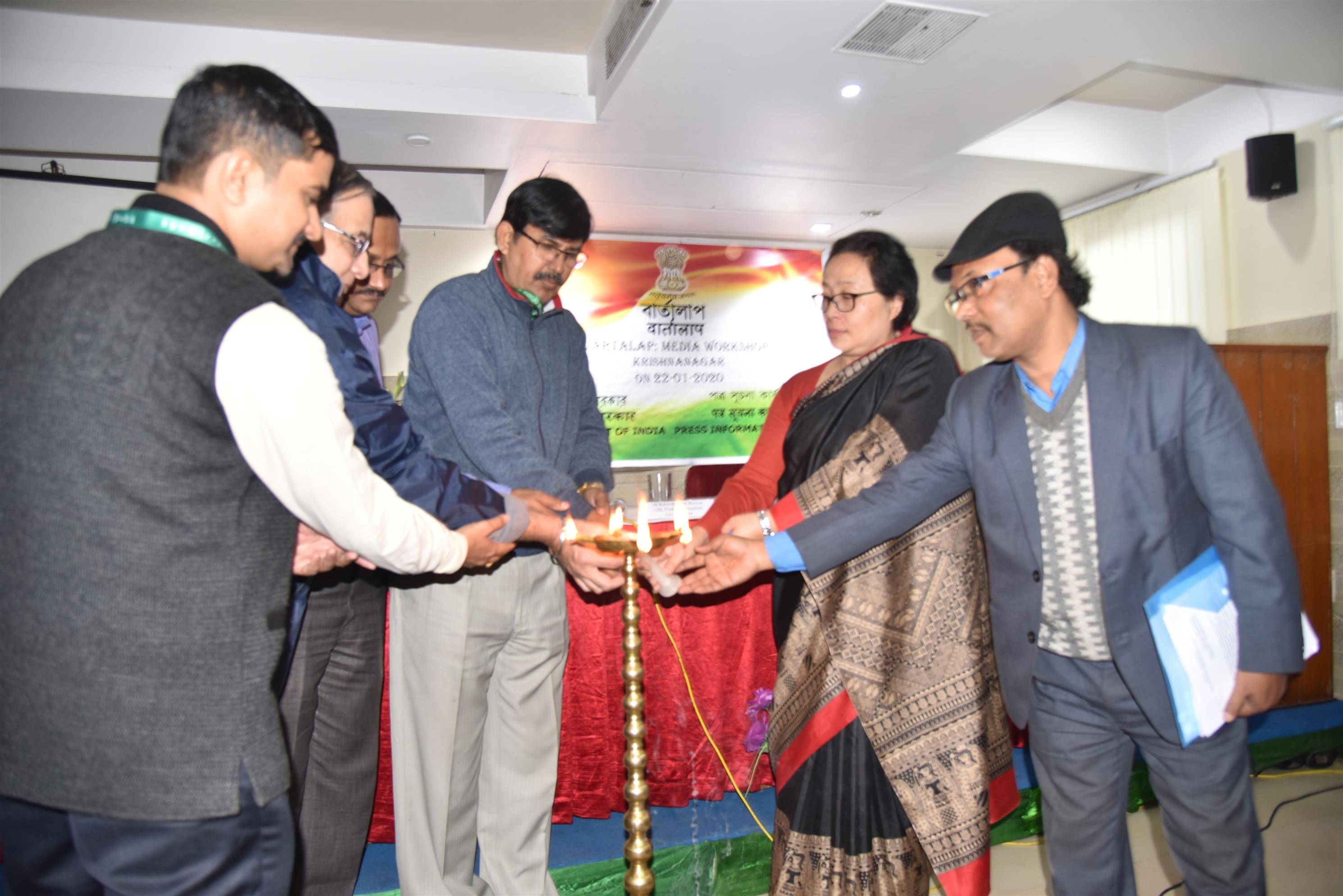 Ms Jane Namchu, ADG(M&C),PIB, Kolkata and administrative and  media persons of Nadia District lighting the lamp to inaugurate  media workshop, Vartalap in the District on January 22,2020.