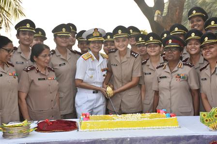 The traditional cake being cut by the newly commissioned nursing officers along with the Chief Guest Surgeon Rear Admiral Arti Sarin, Commanding Officer INHS Asvini