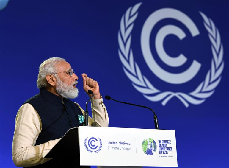 प्रधानमंत्री श्री नरेन्द्र मोदी 01 नवंबर, 2021 को स्कॉटलैंड के ग्लासगो में कॉप-26 शिखर सम्मेलन में राष्ट्रीय वक्तव्य देते हुए।:Prime Minister