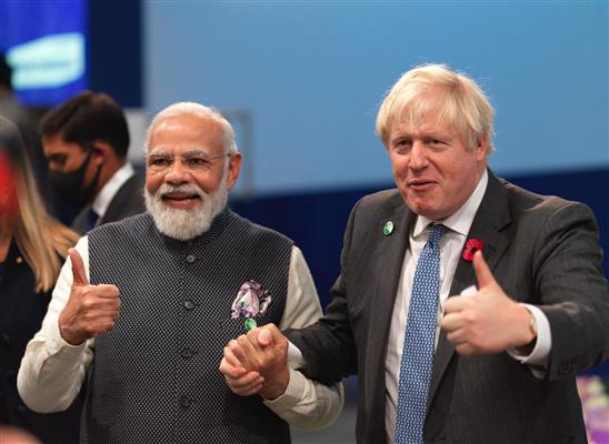 प्रधानमंत्री श्री नरेन्द्र मोदी और ब्रिटेन के प्रधानमंत्री श्री बोरिस जॉनसन ने 02 नवंबर, 2021 को ग्लासगो, स्कॉटलैंड में 'स्वच्छ प्रौद्योगिकी नवाचार और परिनियोजन में तेजी' पर आयोजित सत्र में शिरकत की।:Prime Minister
