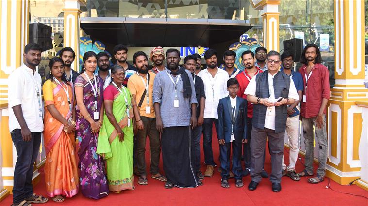 Director, P. Vinothraj, Creative Producer, Soundar Velayutham of the Tamil film ‘Koozhangal’ along with the cast and crew at the red carpet, during the 52nd International Film Festival of India (IFFI-2021), in Panaji, Goa on November 25, 2021.