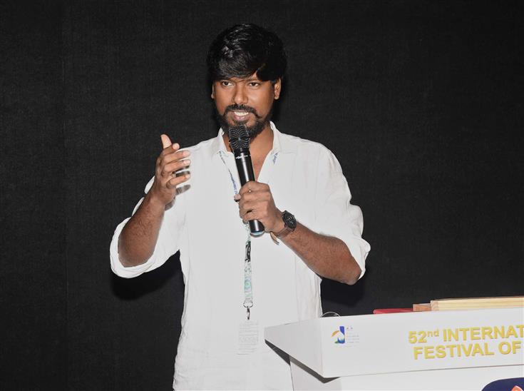 Director, P. Vinothraj of the Tamil film ‘Koozhangal’ addressing at the felicitation, during the 52nd International Film Festival of India (IFFI-2021), in Panaji, Goa on November 25, 2021.