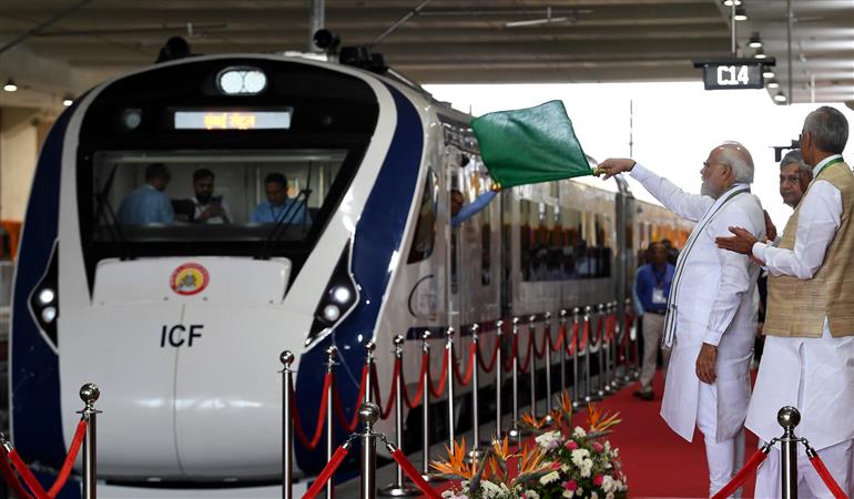 PM flags off the Vande Bharat Express between Gandhinagar and Mumbai at Gandhinagar Station, in Gujarat on September 30, 2022. 