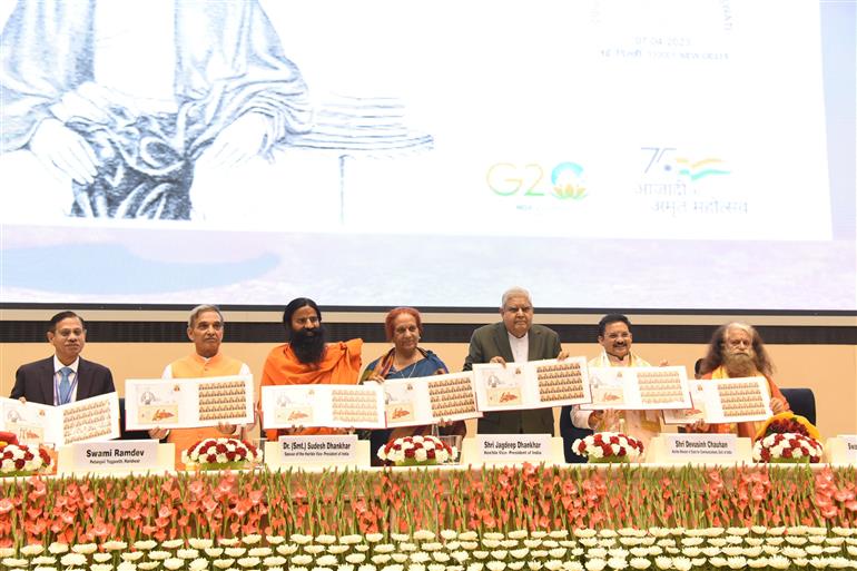 The Vice President, Shri Jagdeep Dhankhar releasing the commemorative postage stamp along with Dr. Sudesh Dhankhar on the 200th birth anniversary of Swami Dayanand Saraswati, in New Delhi on April 7, 2023.