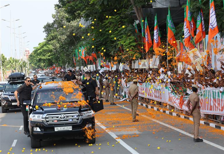 PM being welcomed by people at Chennai, in Tamil Nadu on April 8, 2023.