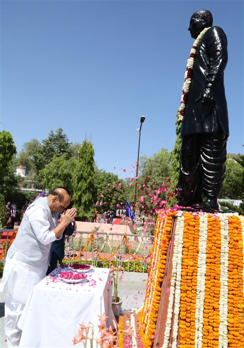 The Union Minister for Defence, Shri Rajnath Singh paying floral tributes at 16th convocation of Janardan Rai Nagar Rajasthan Vidyapeeth (Deemed-to-be-University) at Udaipur, in Rajasthan on April 15, 2023.