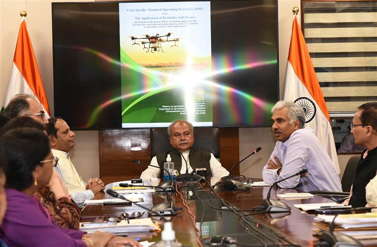 The Union Minister for Agriculture and Farmers Welfare, Shri Narendra Singh Tomar at the release of SOPs for pesticide spray with drones and a booklet on millets machinery, in New Delhi on April 20, 2023.