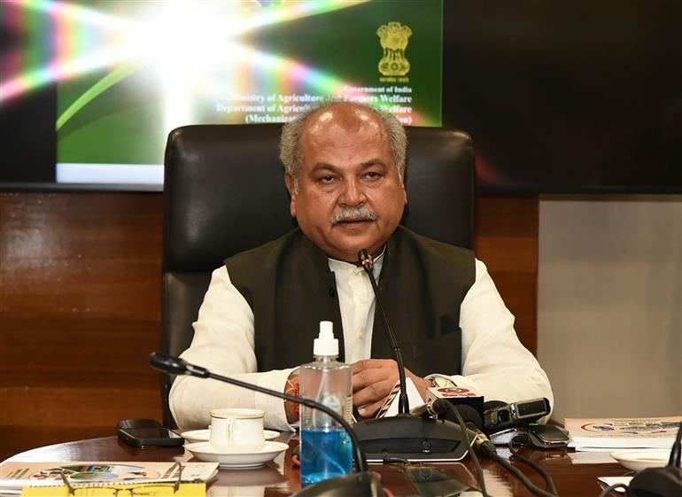 The Union Minister for Agriculture and Farmers Welfare, Shri Narendra Singh Tomar addressing the gathering after releasing SOPs for pesticide spray with drones and a booklet on millets machinery, in New Delhi on April 20, 2023.