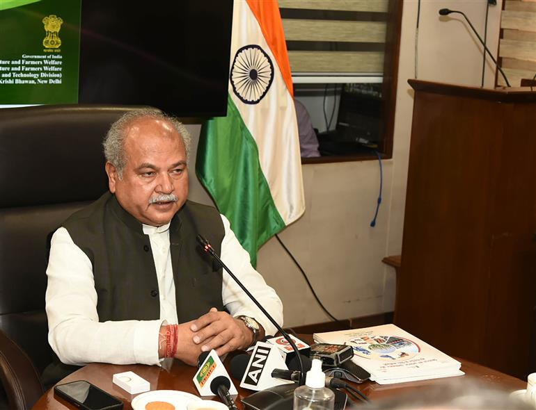 The Union Minister for Agriculture and Farmers Welfare, Shri Narendra Singh Tomar addressing the gathering after releasing SOPs for pesticide spray with drones and a booklet on millets machinery, in New Delhi on April 20, 2023.