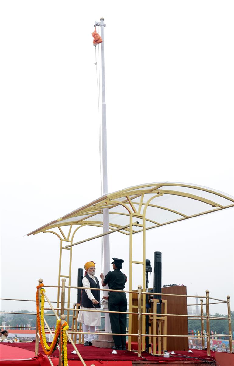 PM unfurling the Tricolour flag at the ramparts of Red Fort on the occasion of 77th Independence Day, in New Delhi on August 15, 2023.