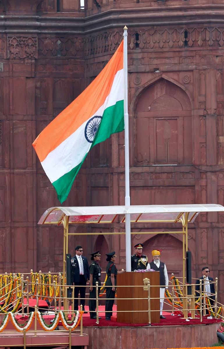 PM unfurling the Tricolour flag at the ramparts of Red Fort on the occasion of 77th Independence Day, in New Delhi on August 15, 2023.