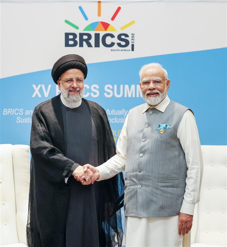 PM in a bilateral meeting with the President of the Islamic Republic of Iran, Dr. Seyyed Ebrahim Raisi during the 15th BRICS Summit at Johannesburg, in South Africa on August 24, 2023.