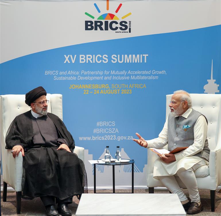 PM in a bilateral meeting with the President of the Islamic Republic of Iran, Dr. Seyyed Ebrahim Raisi during the 15th BRICS Summit at Johannesburg, in South Africa on August 24, 2023.