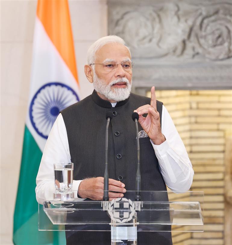 PM addressing the Press meet with the Prime Minister of Greece, Mr Kyriakos Mitsotakis at Athens, in Greece on August 25, 2023.