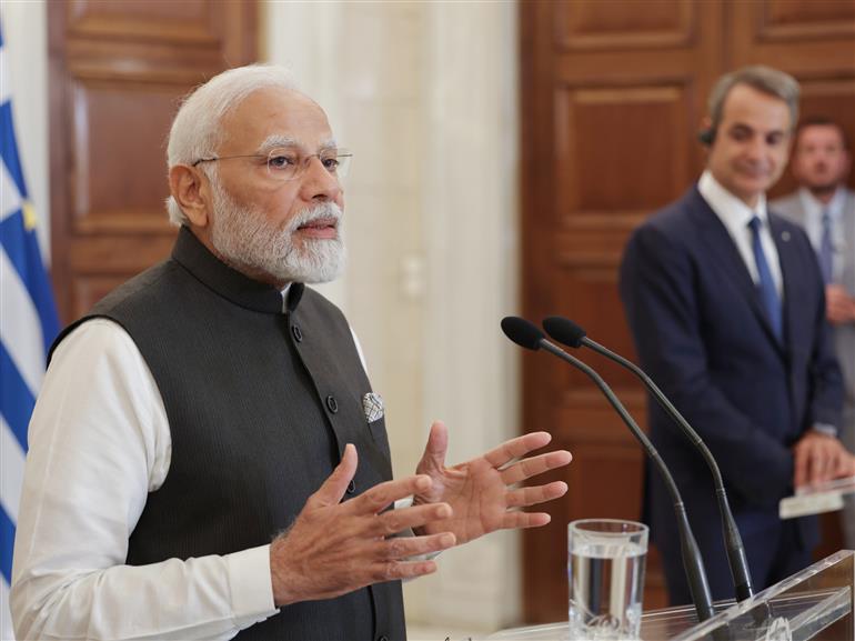 PM addressing the Press meet with the Prime Minister of Greece, Mr Kyriakos Mitsotakis at Athens, in Greece on August 25, 2023.