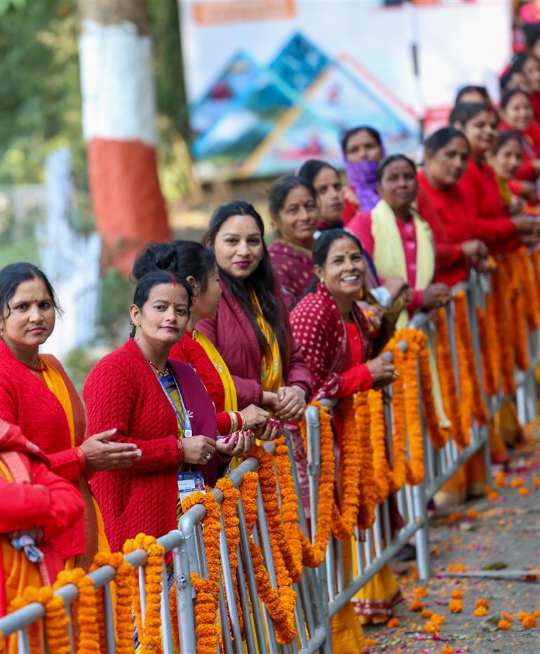 PM being welcomed by people on his arrival in Dehradun on December 08, 2023.