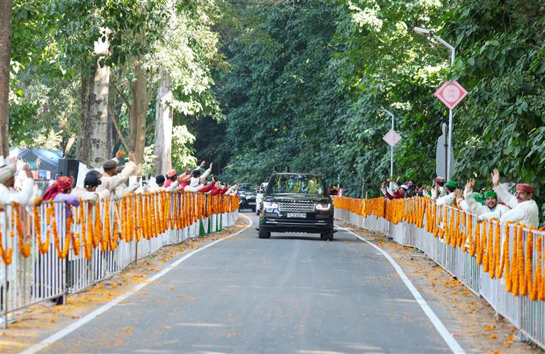 PM being welcomed by people on his arrival in Dehradun on December 08, 2023.