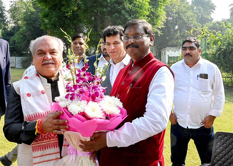 The Union Minister for Tribal Affairs, Shri Arjun Munda meets former Union Minister for Agriculture and Farmers Welfare, Shri Narendra Singh Tomar, in New Delhi on December 08, 2023.