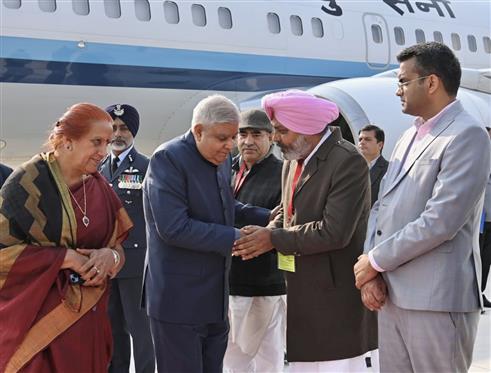 The Vice President and Chairman, Rajya Sabha, Shri Jagdeep Dhankhar and Dr. Sudesh Dhankhar being welcomed by the Transport Minister of Haryana, Shri Mool Chand Sharma, the Finance Minister of Punjab, Shri Harpal Singh Cheema and other dignitaries on their arrival at Chandigarh, in Punjab on December 23, 2023.