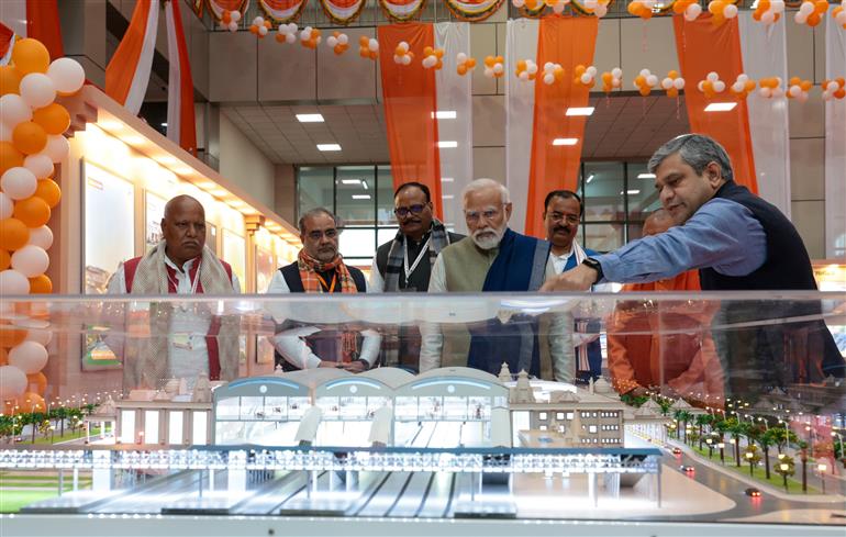 PM took a walkthrough of the model of redeveloped Ayodhya Dham Junction Railway Station at Ayodhya, in Uttar Pradesh on December 30, 2023.