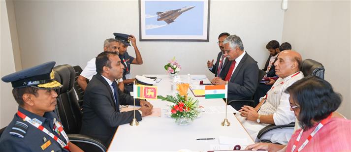 The Union Minister for Defence, Shri Rajnath meets with the Sri Lanka’s Minister of State for Defence, Mr Premitha Bandara Tennakoon on the sidelines of Aero India 2023, in Bengaluru on February 13, 2023.